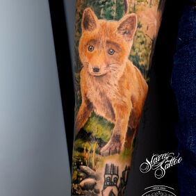 Tattoo Fox forest tattoo on the forearm motif: nature style: realistic
