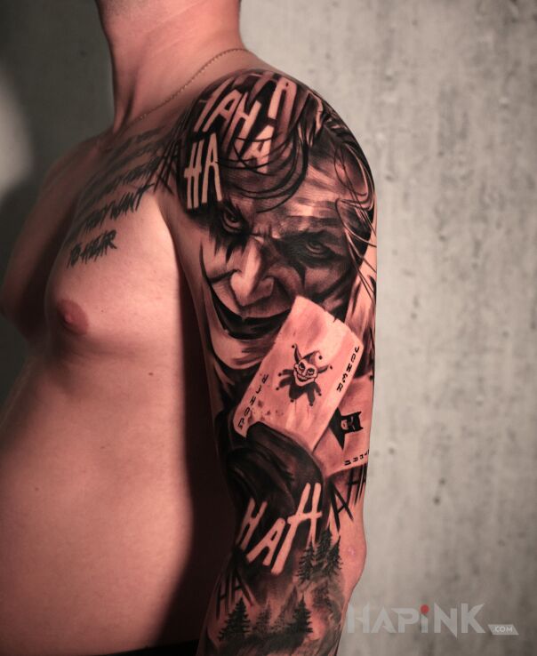 Tattoo Let's put a smile on that face! in black and gray motif and realistic style on the shoulder