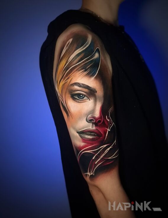 Tattoo Kolorowy tatuaż kobieta in faces motif and realistic style On the arm