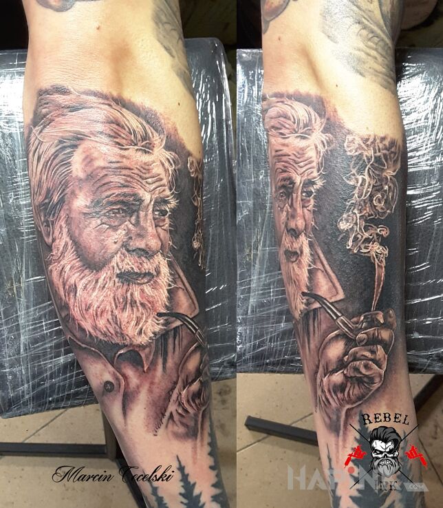 Tattoo Dziadek :) in faces motif and realistic style on the forearm