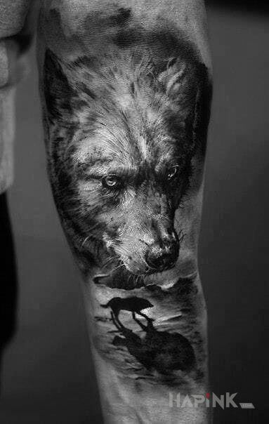 Tattoo Wilczur in animals motif and realistic style on the forearm