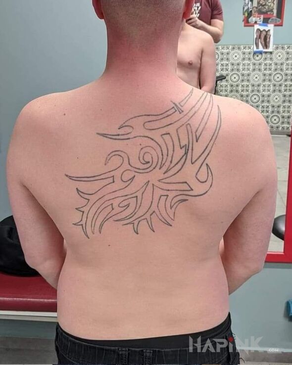 Tattoo Cover czegoś 😅 in failed motif and tribal style on the back