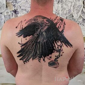 Tattoo Cover of something similar to tribal on the back motif: cover-up style: realistic