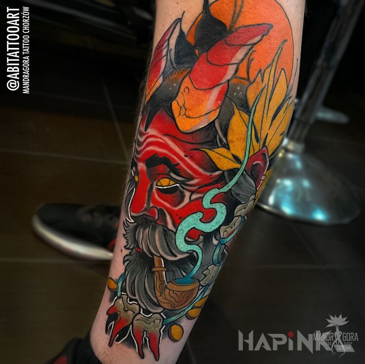Tattoo Szatan in colorful motif and neo-traditional style on the calf