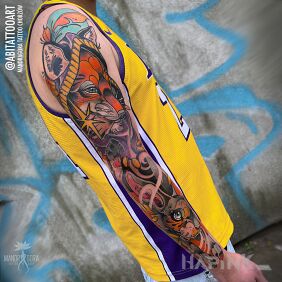 Tattoo Custom sleeve on the upper arm motif: colorful style: neo-traditional