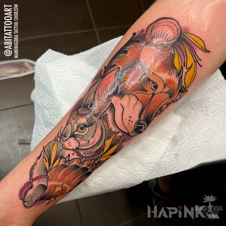 Tattoo Niedźwiedź i królik in animals motif and neo-traditional style On the arm