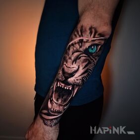 Tattoo Tiger on the forearm on the forearm motif: animals style: realistic