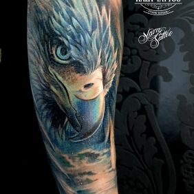 Tattoo Color Eagle Tattoo on the forearm motif: colorful style: realistic