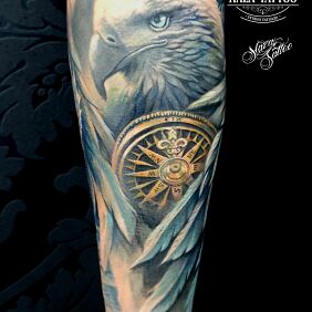 Tattoo Eagle compass tattoo color on the forearm motif: cover-up style: realistic