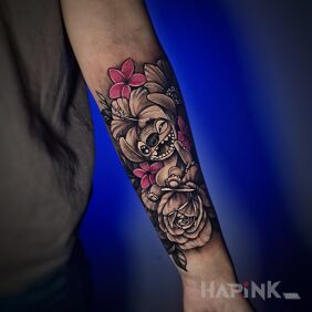 Tattoo Stitch and flowers tattoo on the forearm on the forearm motif: characters style: graphic / illustrative