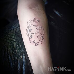 Tattoo Madonna On the arm motif: black and gray style: contour / linework