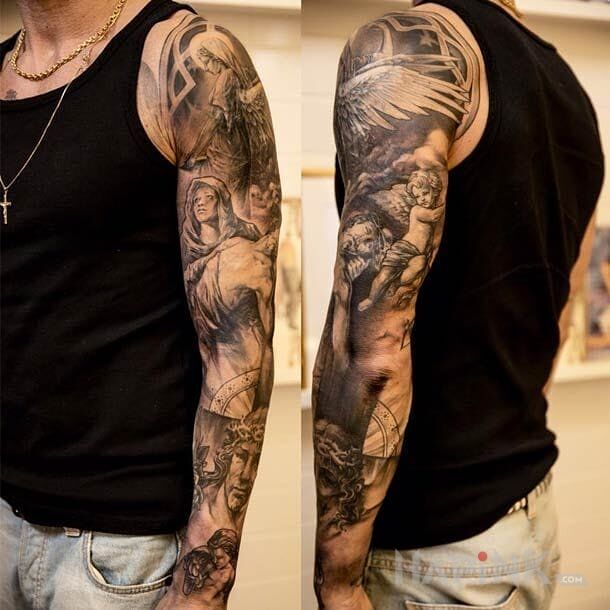 Tattoo Religijny rękaw in religious motif on the forearm