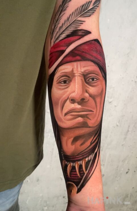 Tattoo Malarski Indianin! in faces motif and realistic style On the arm