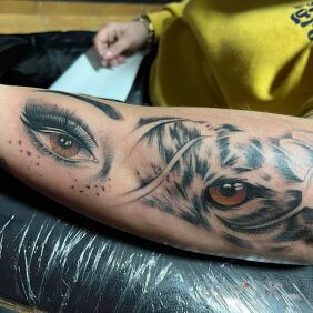 Tattoo Beauty and the Beast On the arm motif: black and gray style: realistic