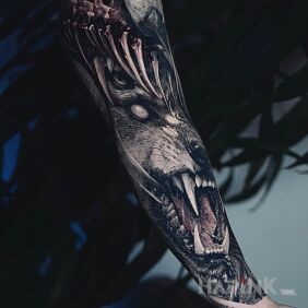 Tattoo Hellish wolfhound On the arm motif: animals style: realistic