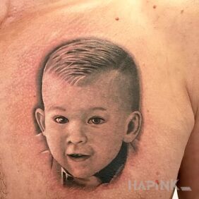 Tattoo Portrait for son on the chest motif: faces style: realistic
