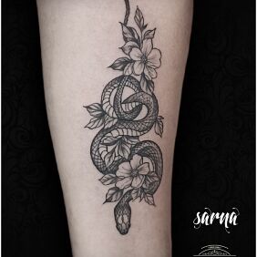 Tattoo Snake flowers tattoo On the arm motif: flowers style: graphic / illustrative