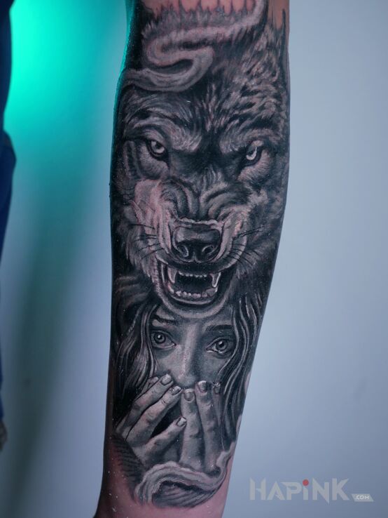 Tattoo Wilk i kobieta in dark motif and realistic style on the forearm