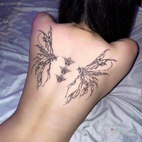 Tattoo Wings on the shoulder blades motif: wings