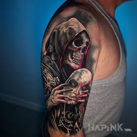 Tattoo Skull and Santa Muerte on the upper arm motif: skulls style: realistic