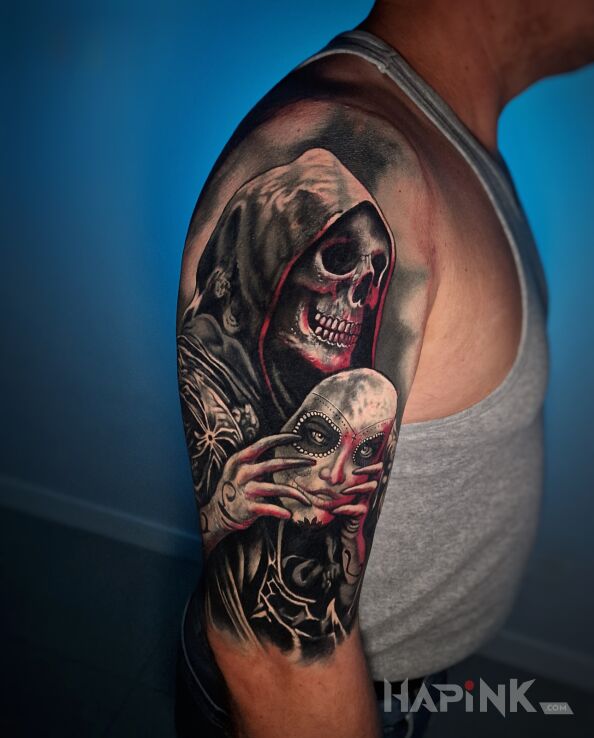 Tattoo Czaszka i santa muerte in dark motif and realistic style on the upper arm