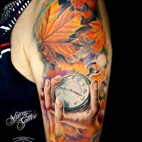 Tattoo Autumn leaves Clock Hand tattoo On the arm motif: floral style: realistic