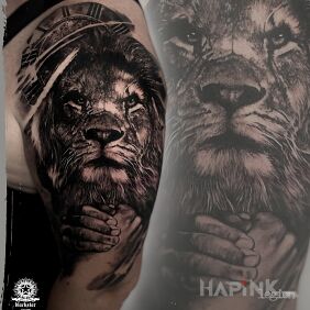 Tattoo Lion and family. on the upper arm motif: black and gray style: realistic