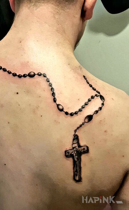 Tattoo Religijny in religious motif and realistic style on the back