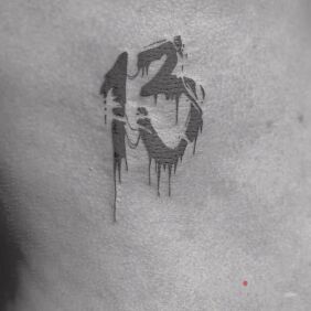 Tattoo Lucky 13 on the ribs motif: other style: blackwork / blackout
