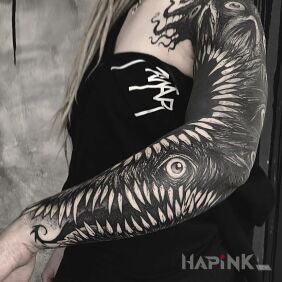 Tattoo Beast from the darkness on the shoulder motif: sleeves style: blackwork / blackout