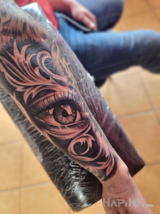 Tattoo Trzecie oko zawsze patrzy in other motif and realistic style on the forearm