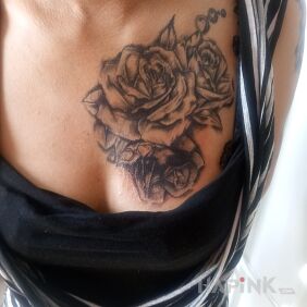 Tattoo Rose on the breast motif: flowers style: realistic