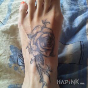Tattoo Rose on the foot motif: flowers