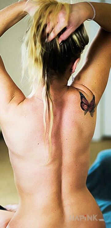 Tattoo Pierwszy i szczery. in butterflies motif on the shoulder blades