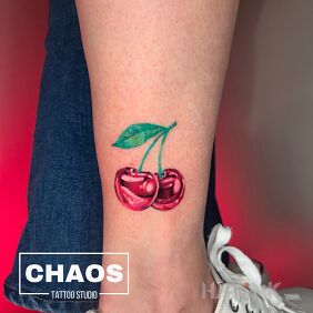 Tattoo Realistic cherry Chaos Studio Poznań near the ankle motif: 3D style: realistic