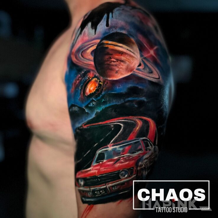 Tattoo Chevrolet ss w kosmosie Chaos Studio Poznań in colorful motif and surrealistic style on the upper arm