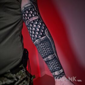 Tattoo Chainmail and armor On the arm motif: war style: realistic