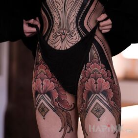 Tattoo Floral on the stomach motif: flowers style: neo-traditional
