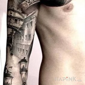 Tattoo Venezuela on the upper arm motif: sleeves style: realistic