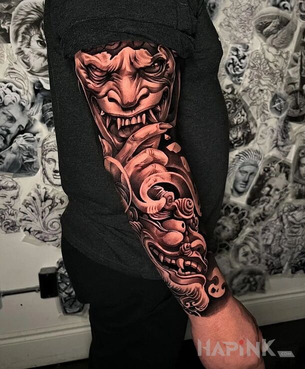 Tattoo Chińskie demoniszcze in black and gray motif and japanese / irezumi style on the forearm