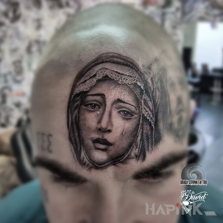 Tattoo Płacząca Maryja in black and gray motif and realistic style on the face
