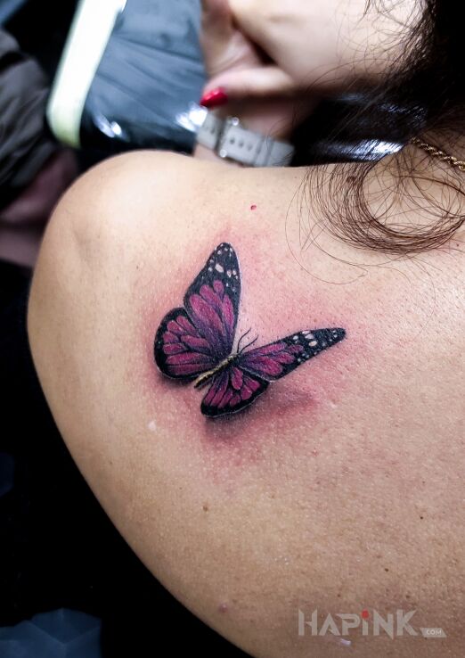 Tattoo Tatuaż damski kolorowy motyl 3d in butterflies motif and realistic style on the back