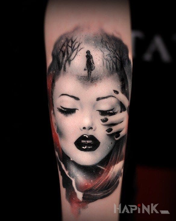 Tattoo Portret kobiety in faces motif and realistic style on the forearm