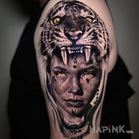Tattoo Woman and wild cat on the upper arm motif: animals style: realistic