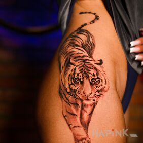 Tattoo Female tiger tattoo on the hip motif: animals style: realistic