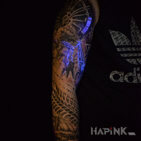 Tattoo UV tattoo on the forearm motif: black and gray style: realistic