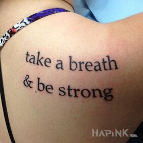 Tattoo Be strong on the shoulder blades motif: lettering