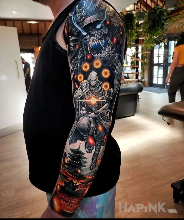 Tattoo Bojowy mnich in colorful motif and realistic style On the arm