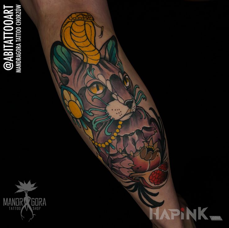 Tattoo Sfinks in animals motif and neo-traditional style on the calf