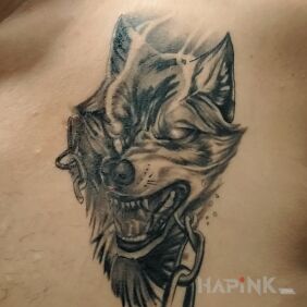 Tattoo Wolf on the chest motif: animals style: realistic